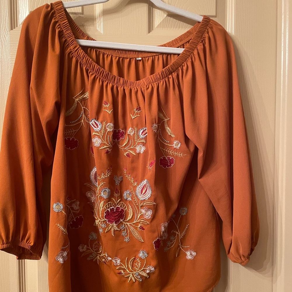 Beautiful off/on shoulder blouse